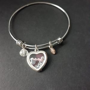 Silvertone charm bracelet with heart pendant